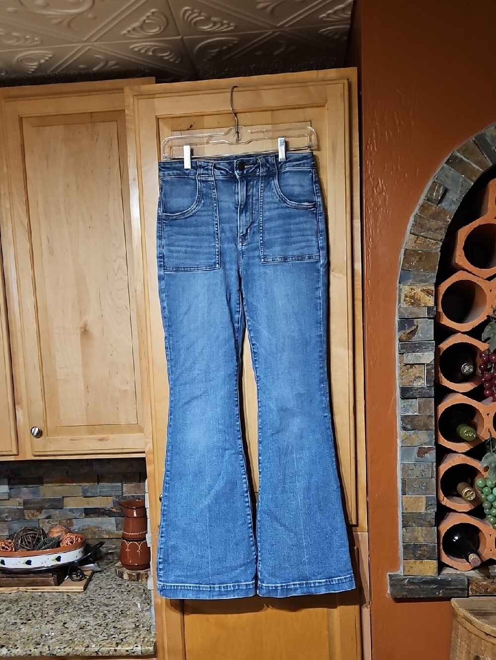 American Eagle Distressed Blue Next Level Stretch Super Hi-Rise Flare Jeans